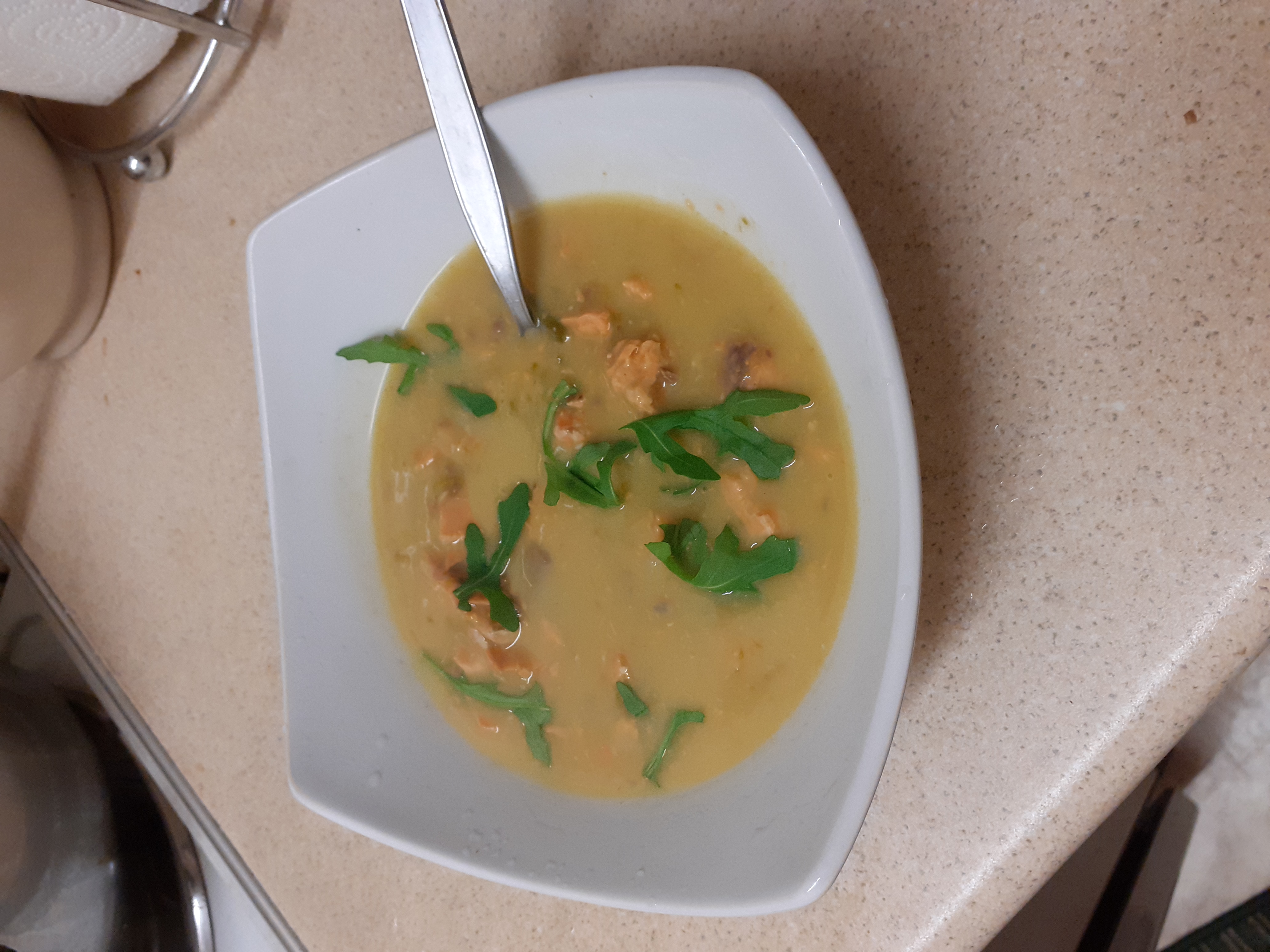 Bowl of salmon and asparagus soup
