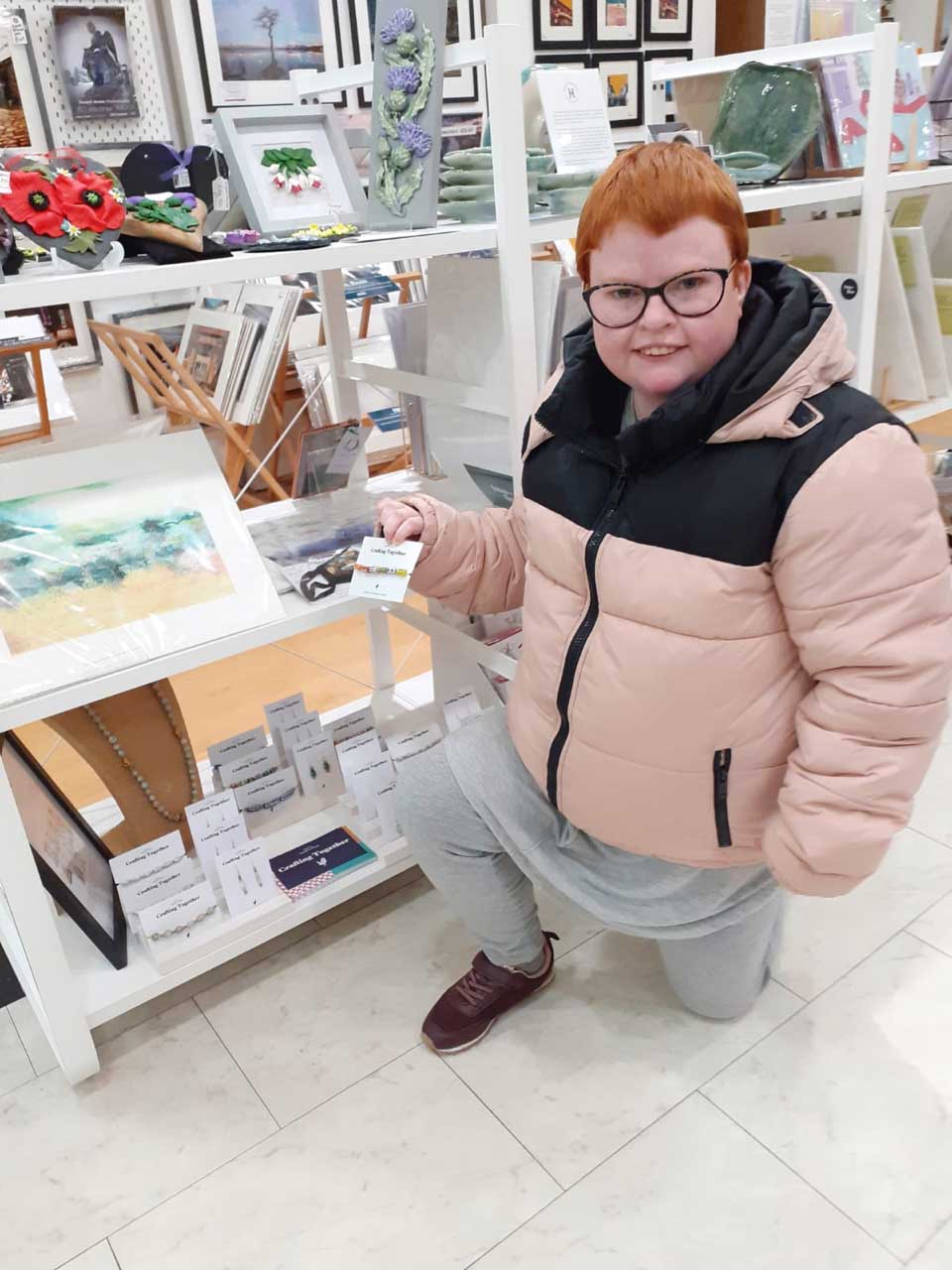 Sarah views her jewellery on sale