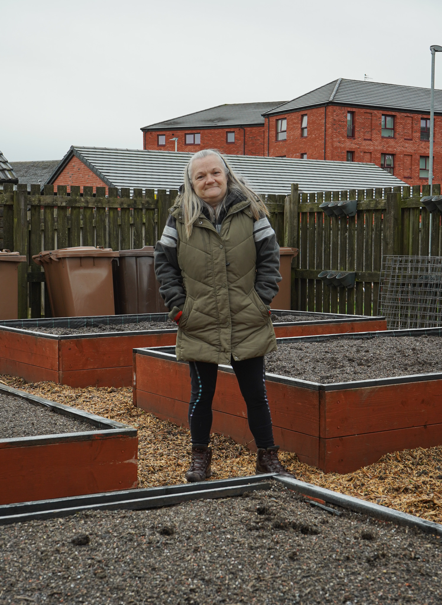 angela posing for picture in garden