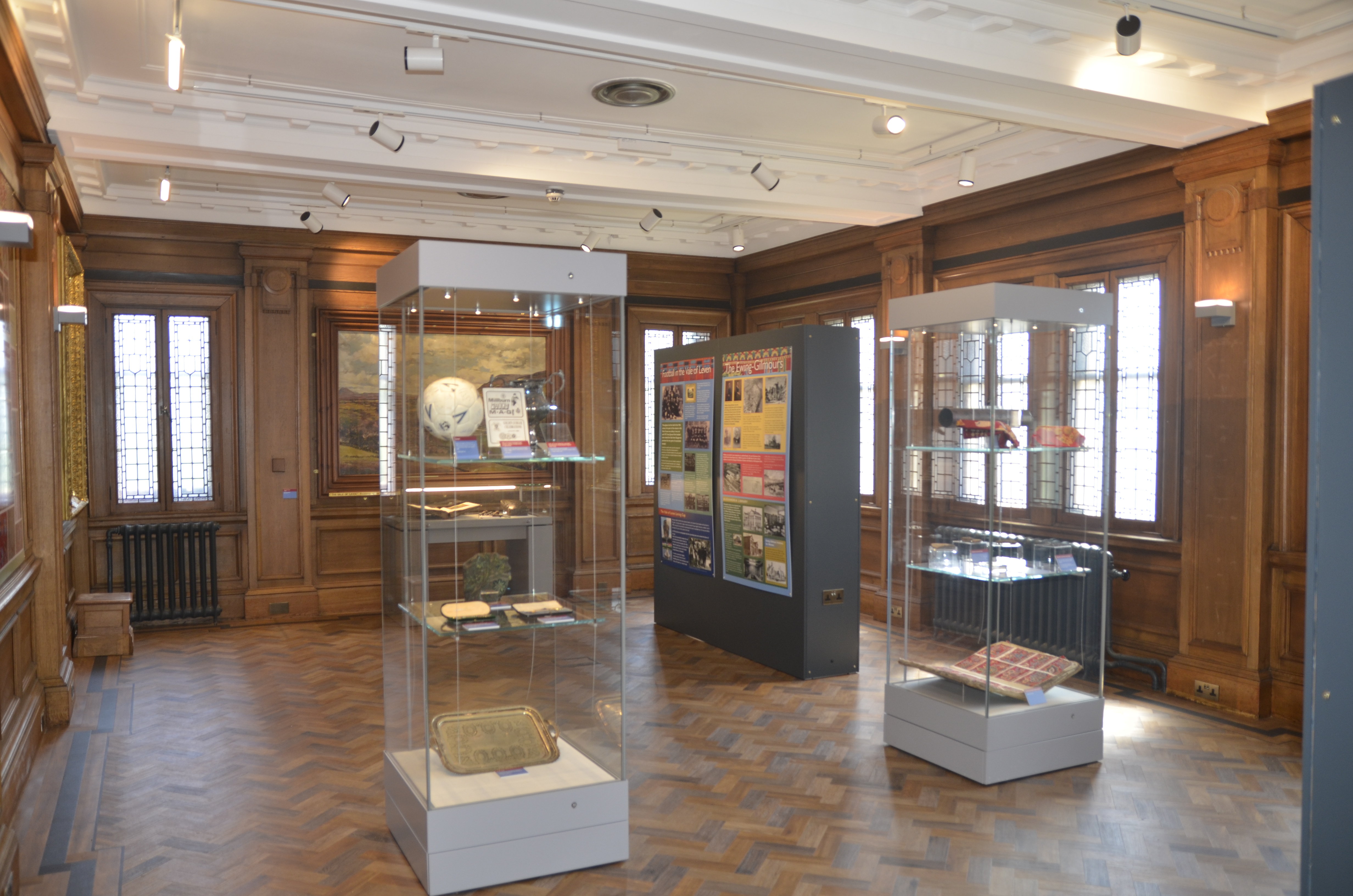 some glass cabinets with heritage items inside