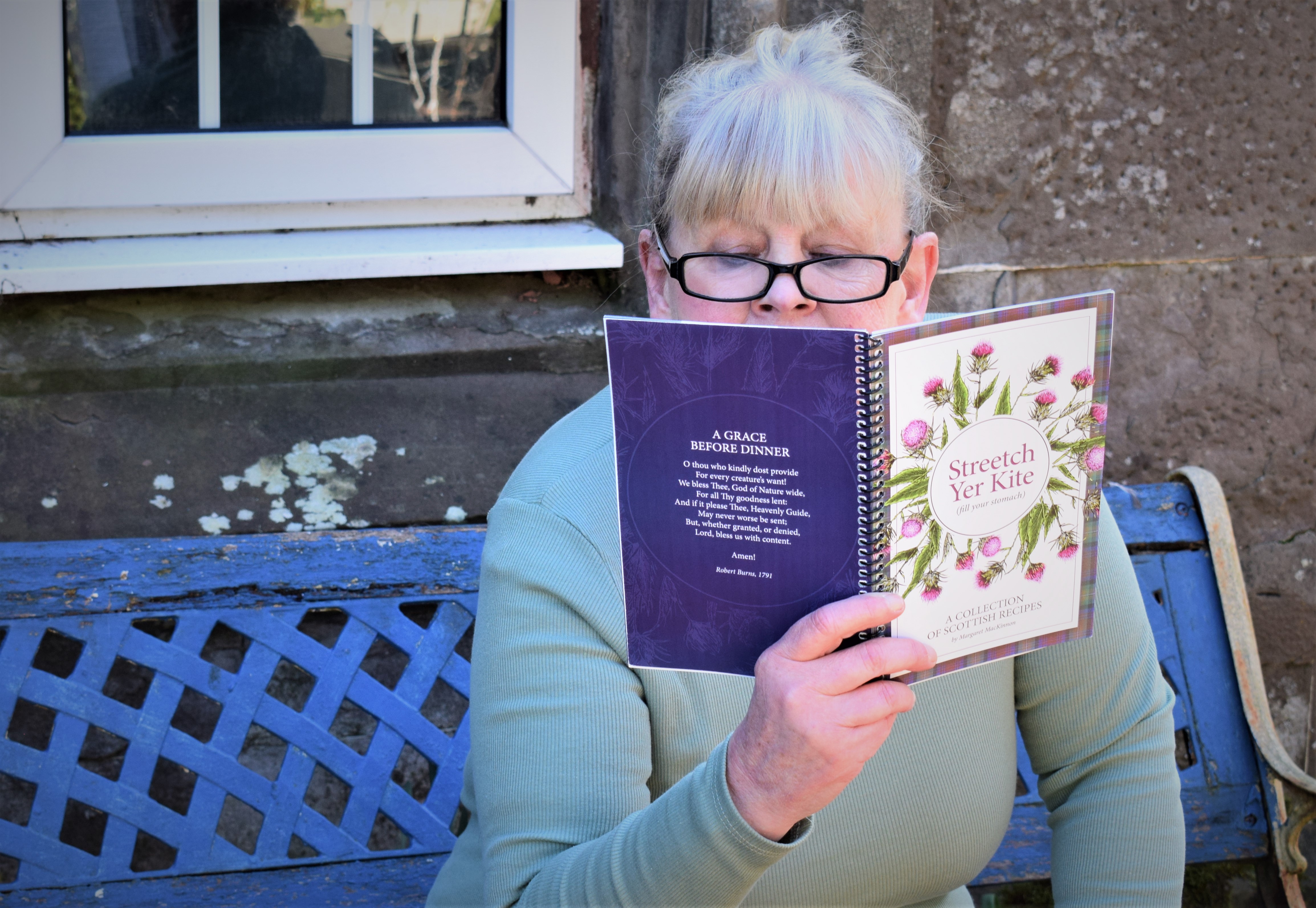 Margaret reading her cookbook