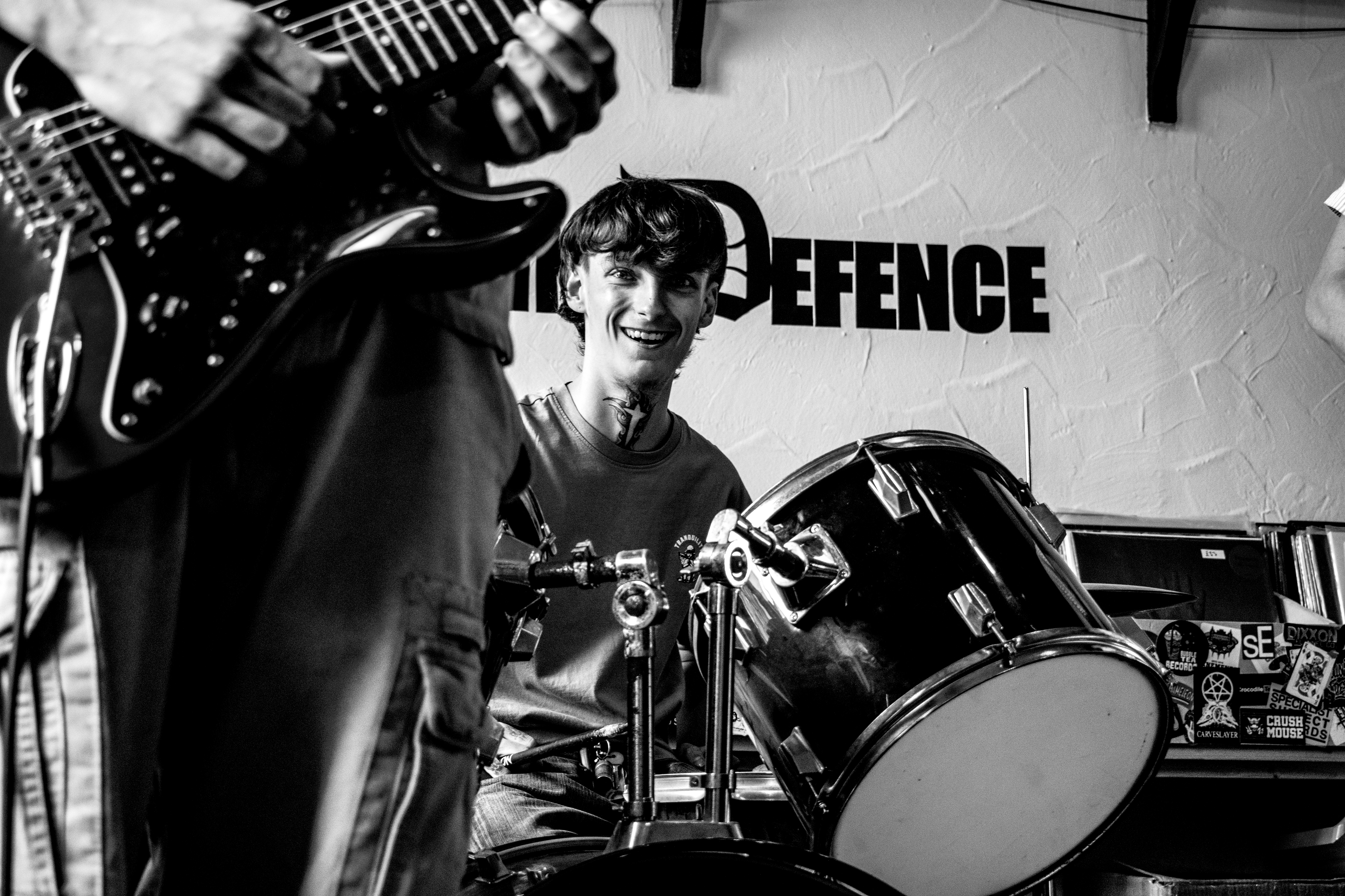 black & white phot of a drummer in action