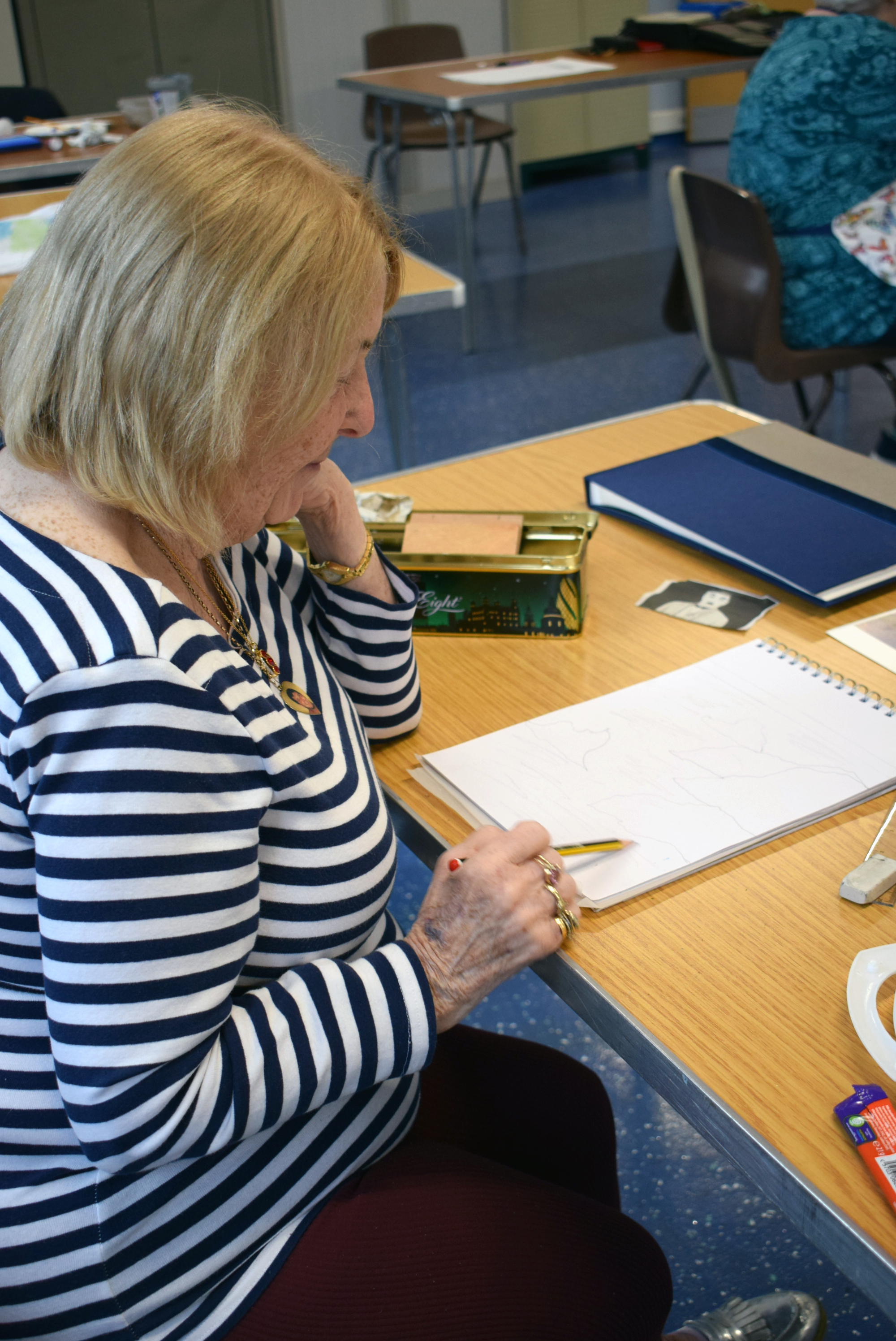 artist starting out sketching on drawing pad