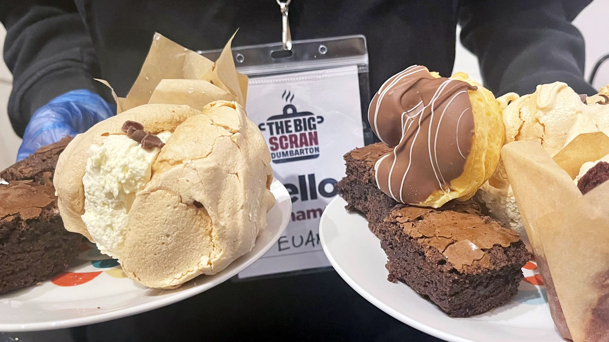 two plates with different kinds of cakes on them