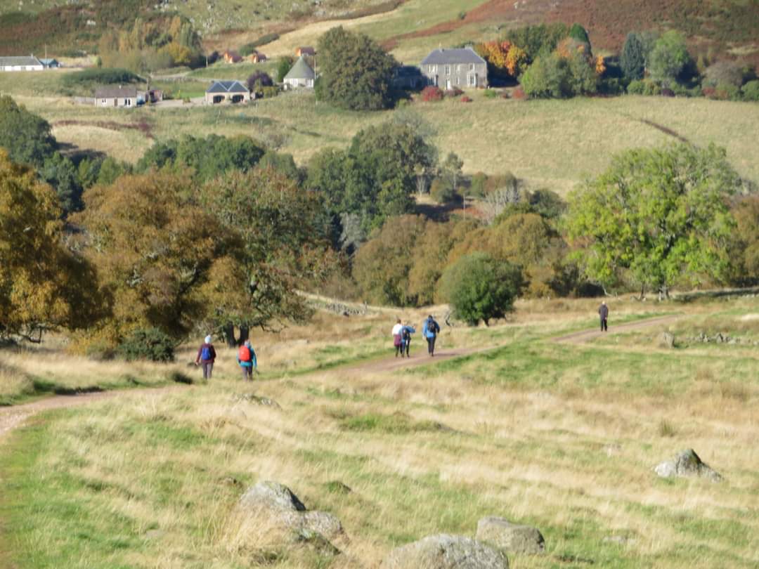 ramblers walking down a hill