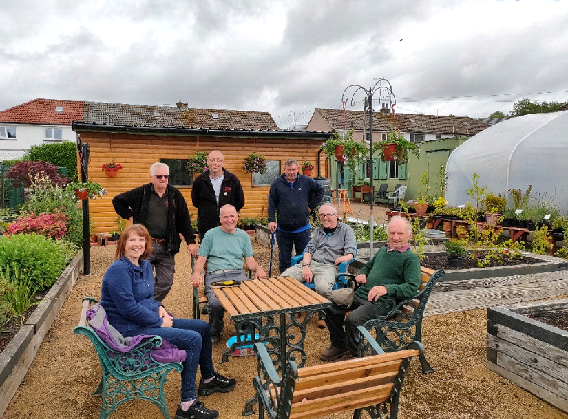 The Bellsmyre Community Garden team posing for a photograph