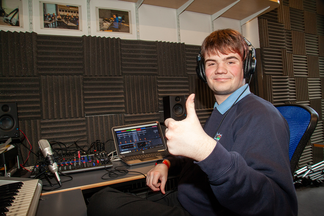 boy giving thumbs up