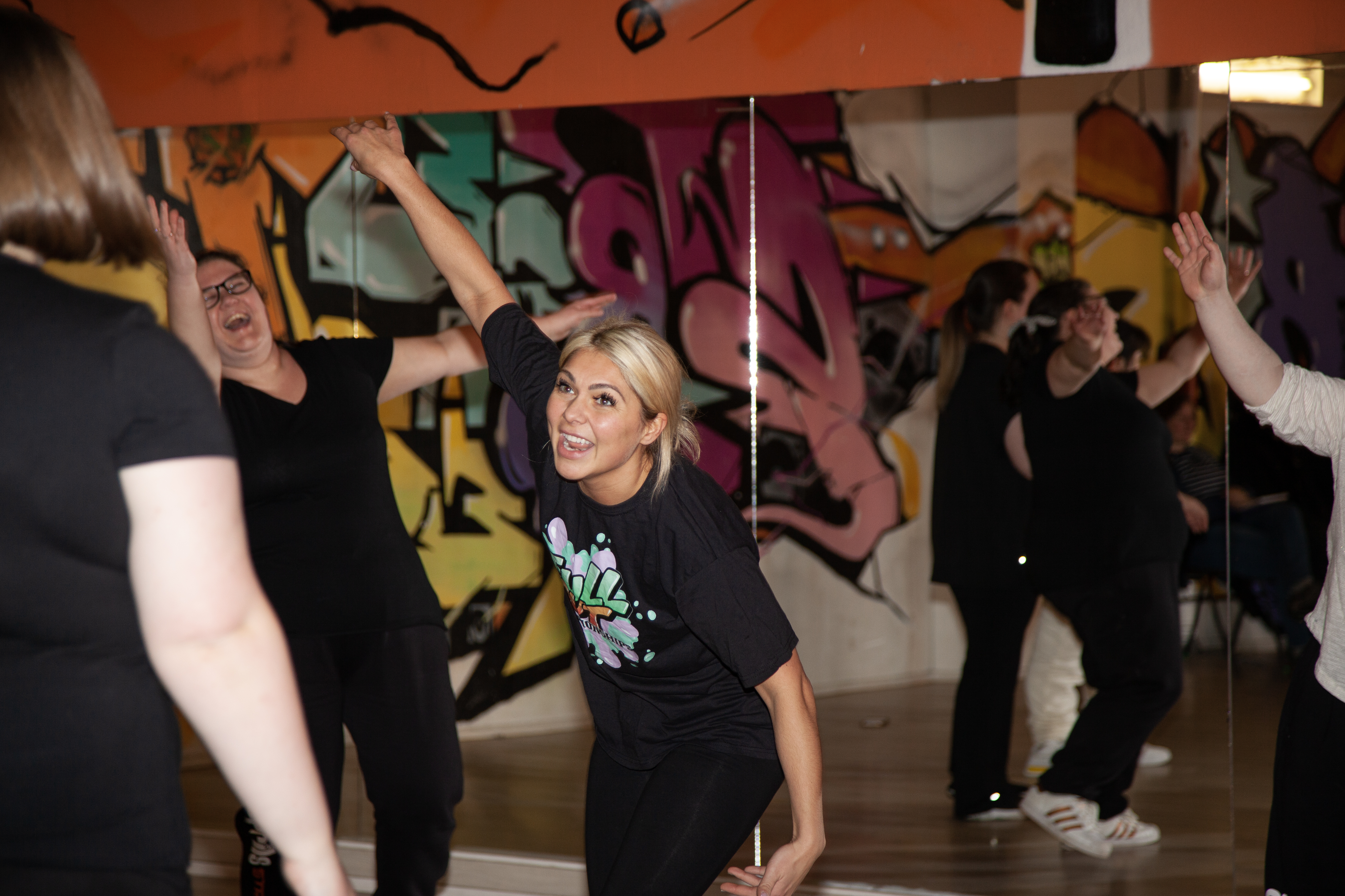 April having fun in class with her dancers