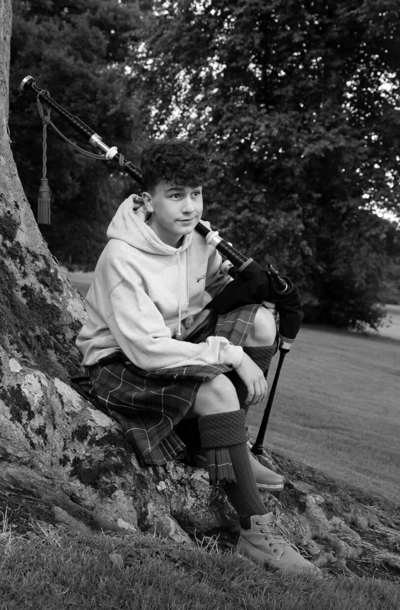 Mark sitting on a tree