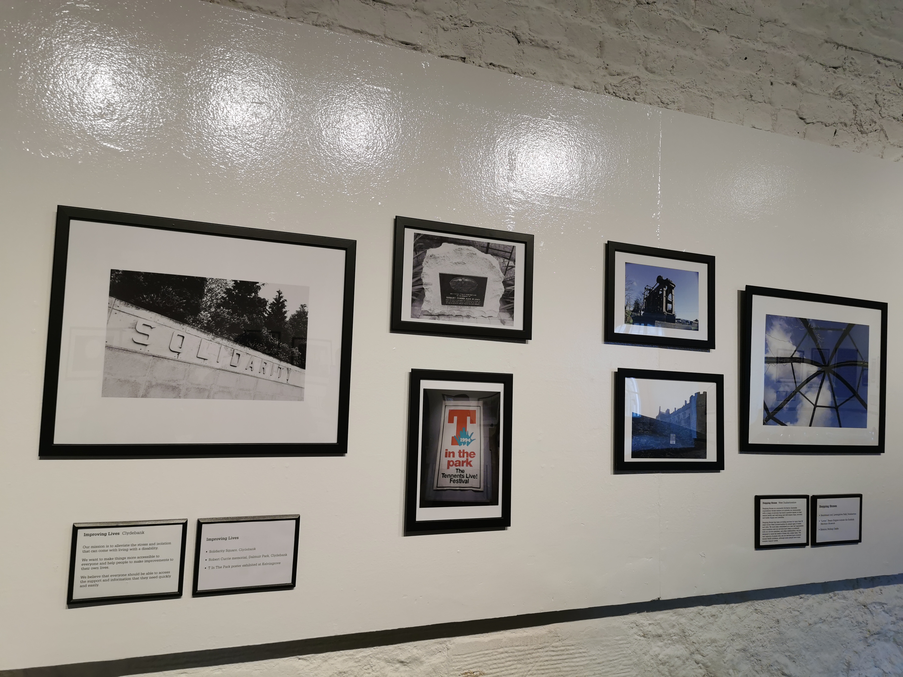 Photographs hanging on a wall