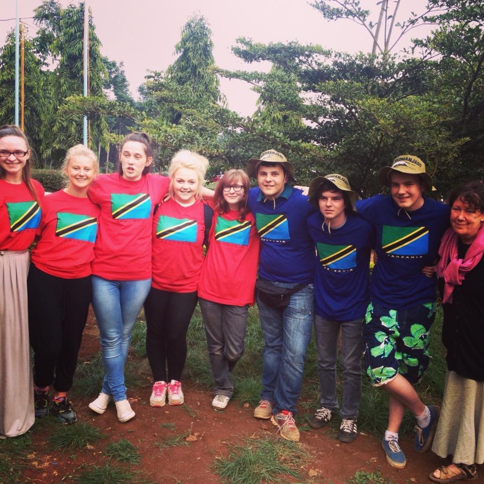 school pupils standing together in a group