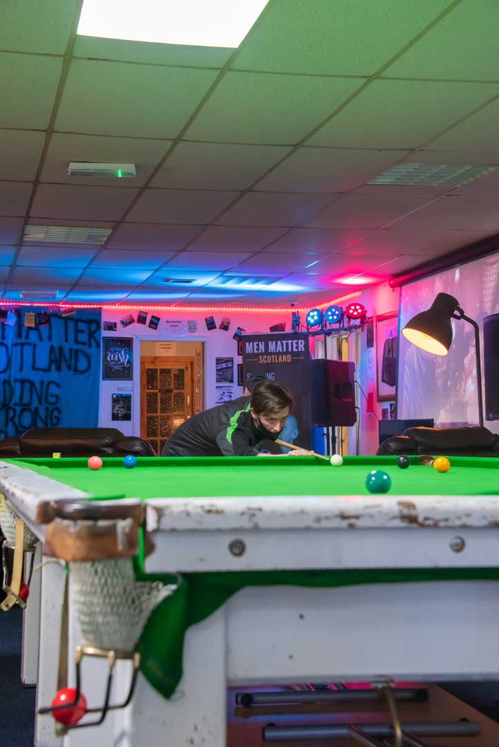 Man playing snooker