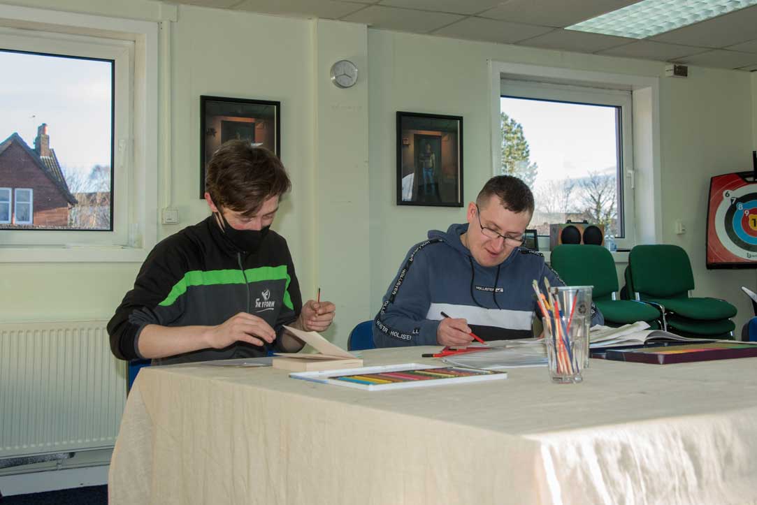 Two men in art group