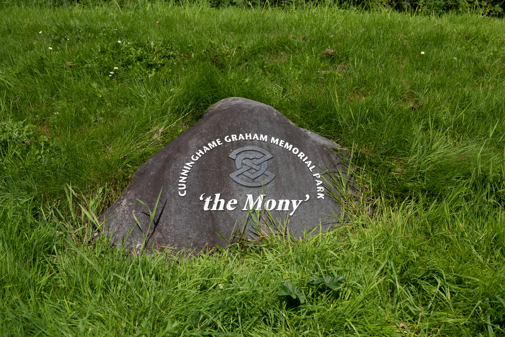 Photo of stone with inscription "Cunninghame Graham Memorial Park"