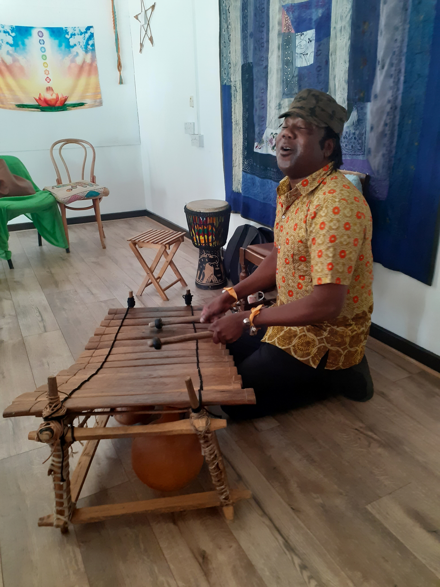 african man playing drums