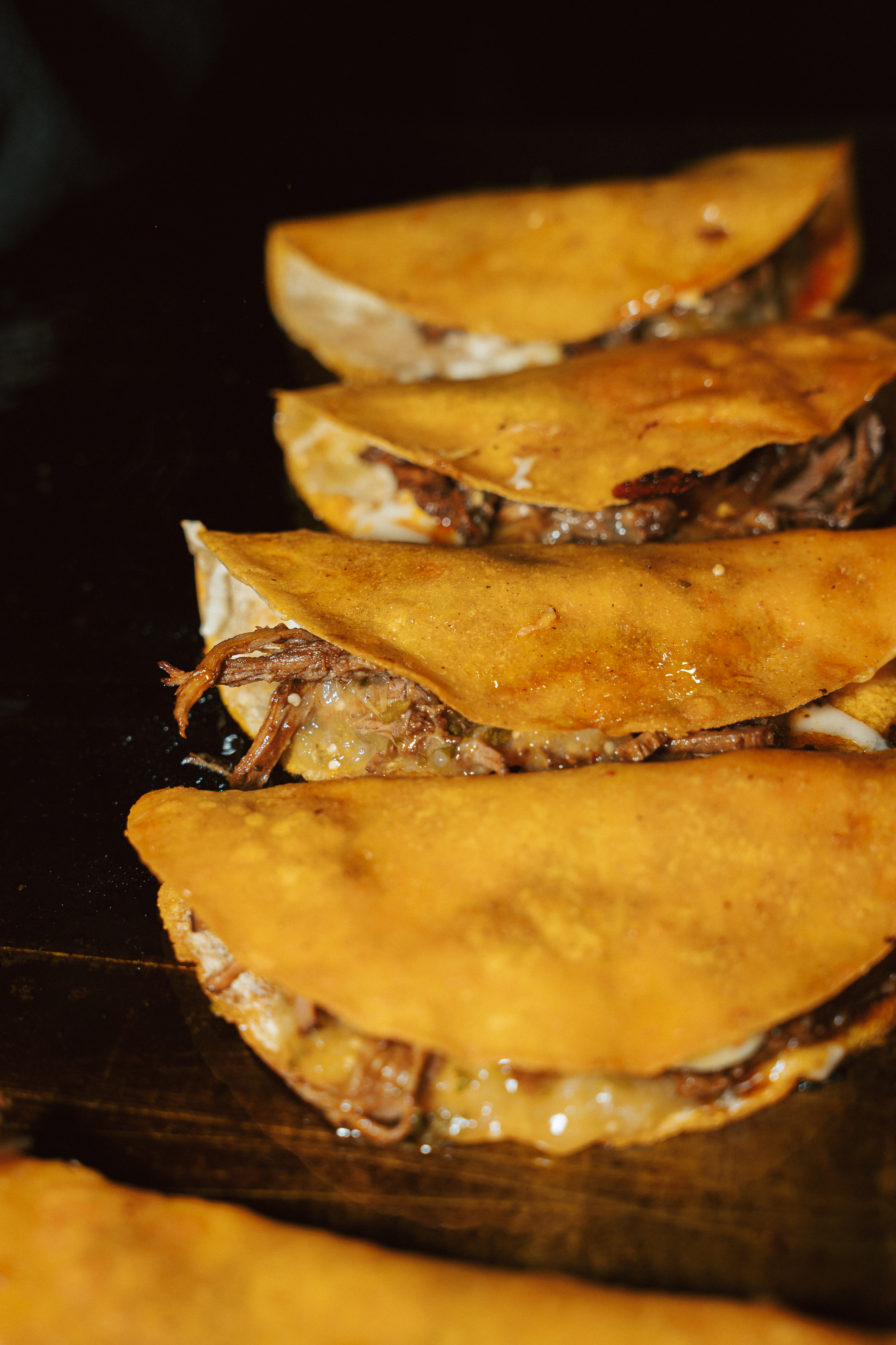 beef tacos cooking on the hotplate