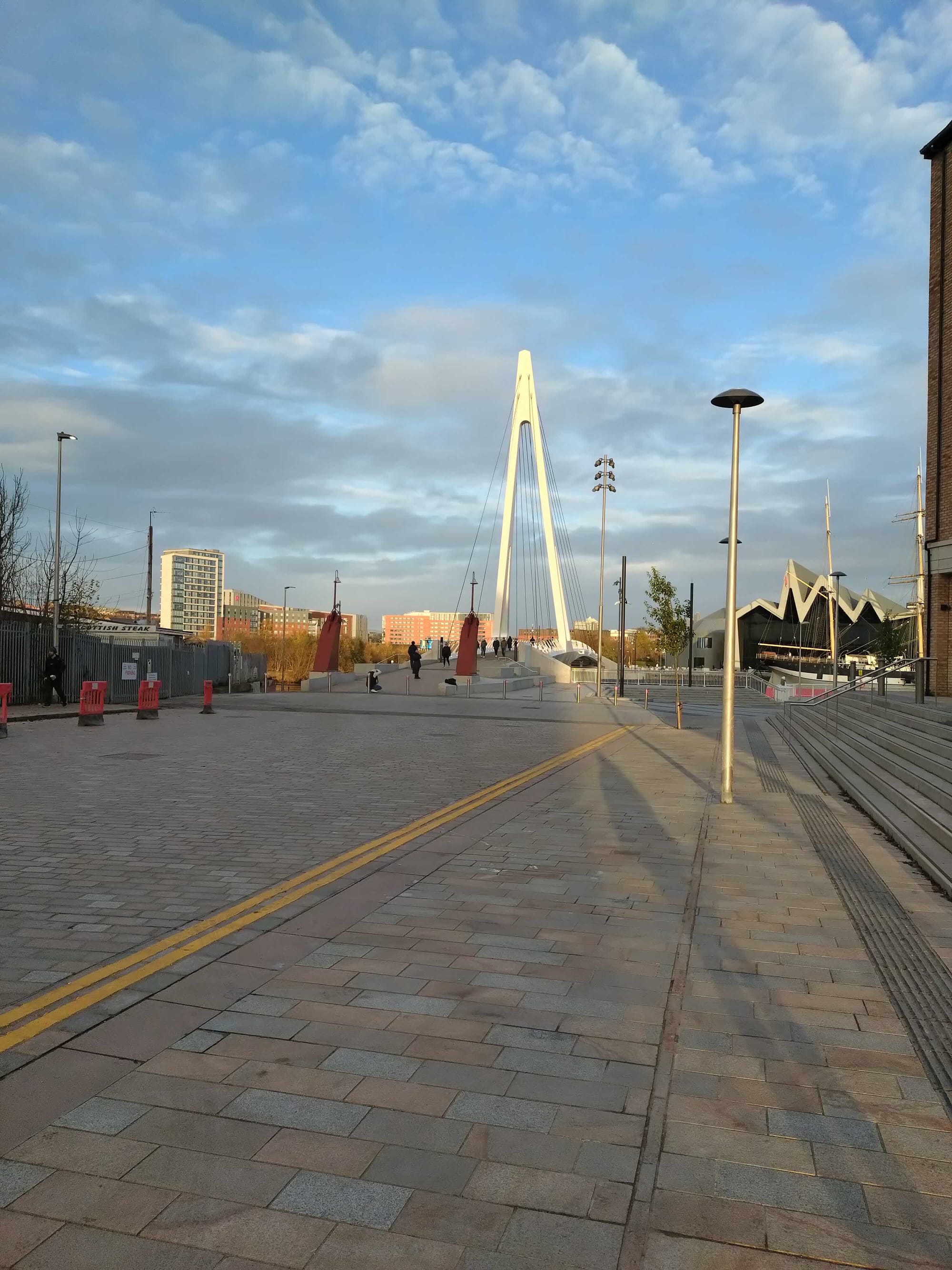 photo looking down a long path towards the Riverside Museum in Glasgow